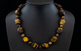 Tiger Eye Fancy Cut Bead Necklace, a str