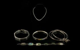 A Mixed Collection Of Silver Jewellery A