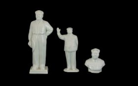 A Collection Of Three Chairman Mao Figures To include two porcelain and one bisque figure, each