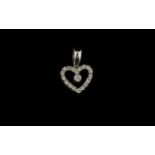 9ct White Gold And Diamond Heart Pendant Stamped 9k, set with round brilliant cut diamonds