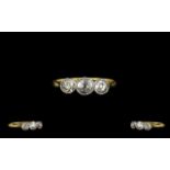 18ct Gold and Platinum Attractive 3 Stone Diamond Set Dress Ring of Pleasing Form.
