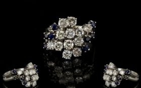 18ct White Gold Attractive Diamond And Sapphire Set Cluster Ring flower head design diamonds and