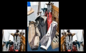 A Quantity Of Golf Clubs Comprising five canvas and leatherette bags containg approx 40 clubs and