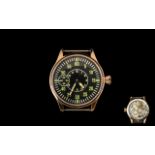 A Modern Replica WWII German Aviation Wrist Watch In copper tone case, glass back,