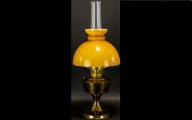 Brass Oil Lamp Of traditional form raised on circular base,
