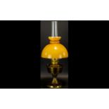 Brass Oil Lamp Of traditional form raised on circular base,