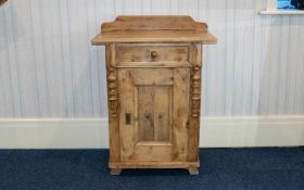 A Pine Bedroom Washstand comprising single cupboard and drawer. Height 27", Width 32".