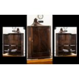 A Late 19th / Early 20th Century Mahogany Corner Cabinet Of Small proportion with single door and