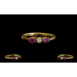 18ct Gold - Attractive 3 Stone Ruby and Diamond Dress Ring, The Two Rubies with Central Diamonds,