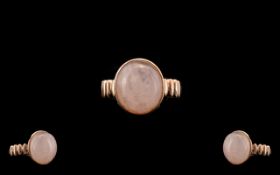 Morganite Solitaire Ring, an 10ct oval cut cabochon of natural morganite,