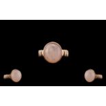 Morganite Solitaire Ring, an 10ct oval cut cabochon of natural morganite,