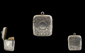 Late Victorian Period Silver Vesta Case with Vacant Cartouche, Chased Floral Decoration to Body.