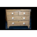 Antique Pine Chest of Drawers comprising two single drawers above two larger drawers. Height 32".