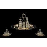 A Silver Plated Cruet Stand Comprising six apertures,