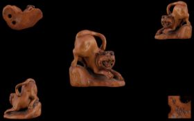 Chinese 19th Century Signed Carved Boxwood Netsuke, In The Form of a Snarling Cat.