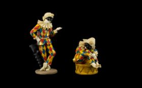 Two Resin Figurines In The Form Of Columbine From The Commedia Dell’Arte Comprising standing figure,