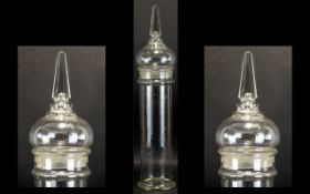 Antique Glass Apothecary Jar And Cover Tall cylindrical jar with with obelisk form top,