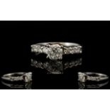 18ct White Gold Very Attractive and Pleasing Diamond Set - Ladies Dress Ring. The Central Diamond