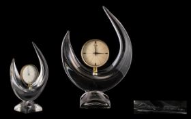 Daum Mid Century Moulded Crystal Crescent Form Clock Raised on square base,