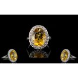 Citrine Statement Halo Ring, an oval cut golden yellow citrine of 8.