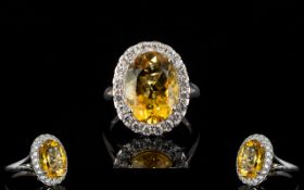 Citrine Statement Halo Ring, an oval cut golden yellow citrine of 8.