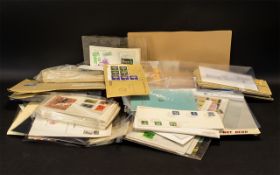 Large Carrier Bag Full of First Day Covers and Commemorative Covers, with loose stamps.