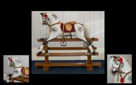 Antique Rocking Horse By Tri-Ang - carved horse on swing rocker frame.