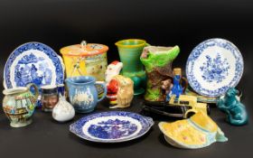 A Mixed Collection Of Ceramics And Collectibles To include vintage Butlins biscuit tin,