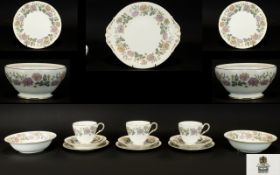 Paragon China Chrysanthemum Pattern Part Tea Service White ground with pale floral pattern and