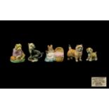 A Small Collection Of Animal And Beatrix Potter Figurines Five items in total to include Beswick