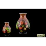 William Moorcroft Signed Flambe Globular Shaped Vase ' Clematis ' Pattern. c.1930's. Height 6.