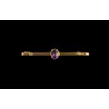9ct Yellow Gold And Diamond Bar Brooch Stamped 9ct, the centre set with oval faceted gemstone,