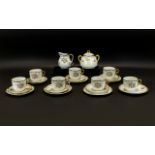 A Japanese Lustre Part Tea Service Comprising twin handle sugar bowl, milk jug,