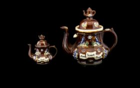 Bargeware Interest A Pair Of Treacle Glazed Teapots Of graduating size, each with applied,