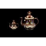 Bargeware Interest A Pair Of Treacle Glazed Teapots Of graduating size, each with applied,