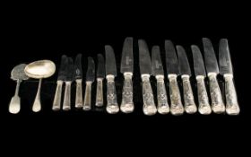 A Collection Of Silver Cutlery Items Sixteen pieces in total to include five butter knives -