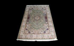 A Very Large Woven Silk Carpet Keshan rug with Eau De Nil ground and traditional Middle Eastern