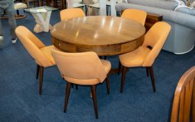 A Mid Century Rosewood Veneer Scandinavian Style Dining Table And Five Chairs Circular top with