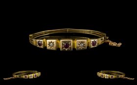 Edwardian Period - Attractive 9ct Gold Ruby and Diamond Set Hinged Bangle with Attached 9ct Gold