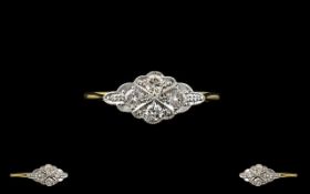 18ct Gold Platinum And Diamond Set Dress Ring Of elegant form the centre of elongated quatrefoil