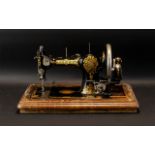 Edwardian Jones Family CS Sewing Machine Housed in original wooden case, serial number 16475,