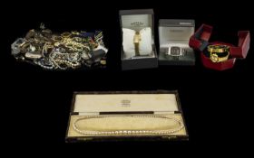 A Collection Of Costume Jewellery A varied lot to include several fashion watches, plastic beads,