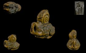 Japanese Late 19thC Novelty Carved Boxwood Netsuke of a snail sitting on the back of a frog,