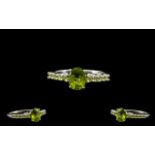 Peridot Classic Style Ring, a central,