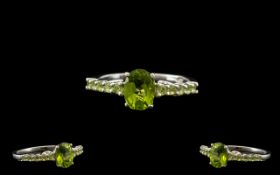 Peridot Classic Style Ring, a central,