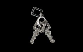 9ct White Gold Pendant In The Form Of A Keyring And Two Diamond Set Keys Fully hallmarked, the