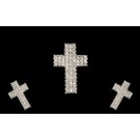 A 9ct White Gold Diamond Cross Set with 54 round brilliant cut diamonds, stamped 375, approx 18
