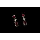 Ruby and Cambodian Zircon Drop Earrings, each earring having a cushion cut ruby, of over 1ct, set