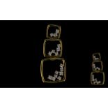 9ct Yellow Gold Diamond Set Pendant three graduating open square mounts, set with 16 round brilliant
