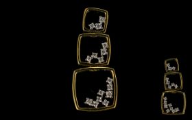9ct Yellow Gold Diamond Set Pendant three graduating open square mounts, set with 16 round brilliant